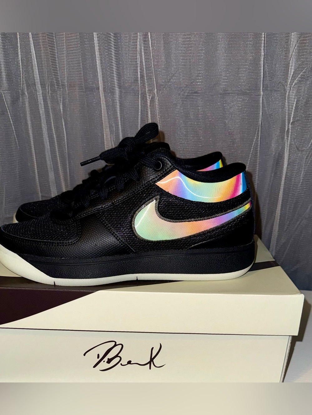Nike Black Low-Top Sneakers with Iridescent Rainbow Swoosh